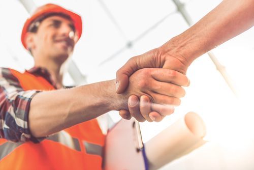 contractor shaking hands - Business & Professions Code 7028.1 BPC makes it illegal for even a licensed contractor to perform asbestos work without certification