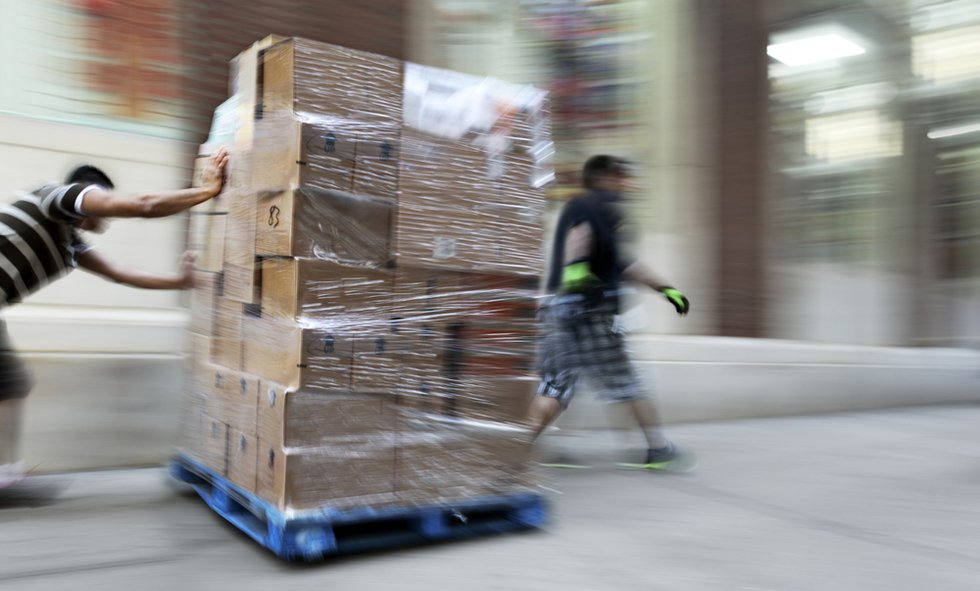 Man stealing boxes of merchandise from a warehouse as an example of conversion in California