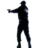 law enforcement officer aiming gun