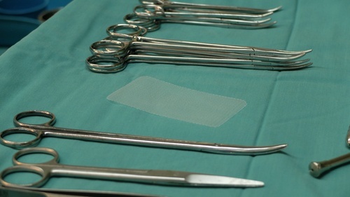 Mesh surgery tools