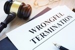 sign that says wrongful termination