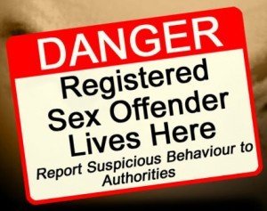 Sticker that says "Danger: Registered Sex Offender Lives Here"
