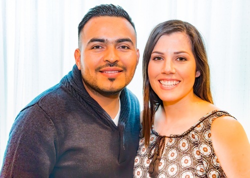 Happy hispanic man and woman