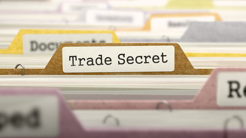 file folder labeled "trade secret"
