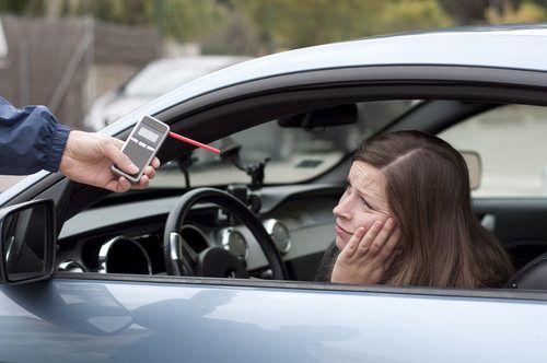 motorist being asked to submit to a handheld breathalyzer test