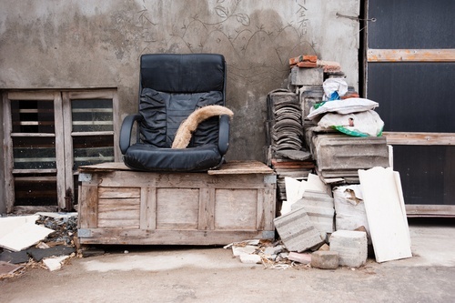 Junk piled up outside a person's home as an example of a private nuisance in California