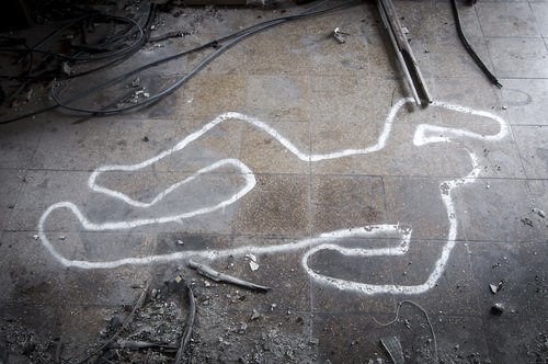 chalk marks of the body of a murder victim