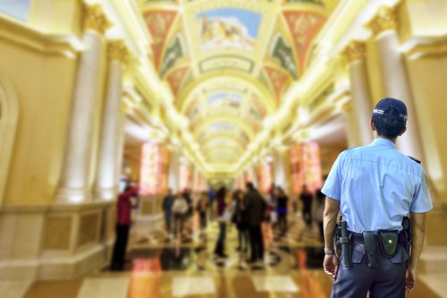 Security guard and crowds at Las Vegas resort - victims injured in a hotel can file a lawsuit for damages