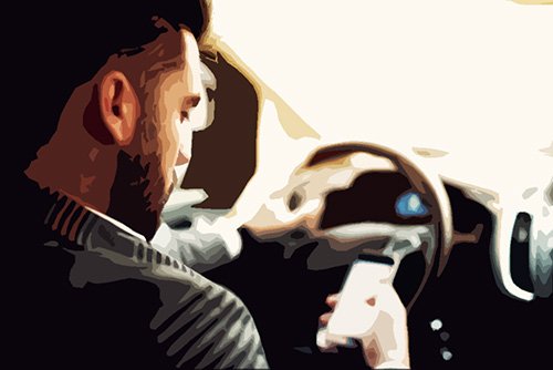 man driving while on mobile phone as an example of what can trigger a cell phone ticket in California