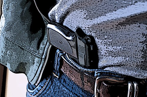 pistola dentro de la cintura de un hombre - Las leyes de armas de fuego de California ya no permiten este tipo de porte abierto