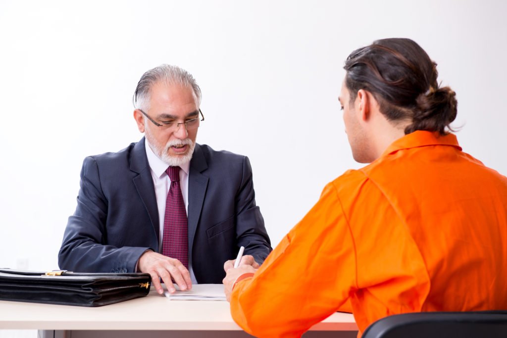 Attorney helping client fill out a 35(c) motion.