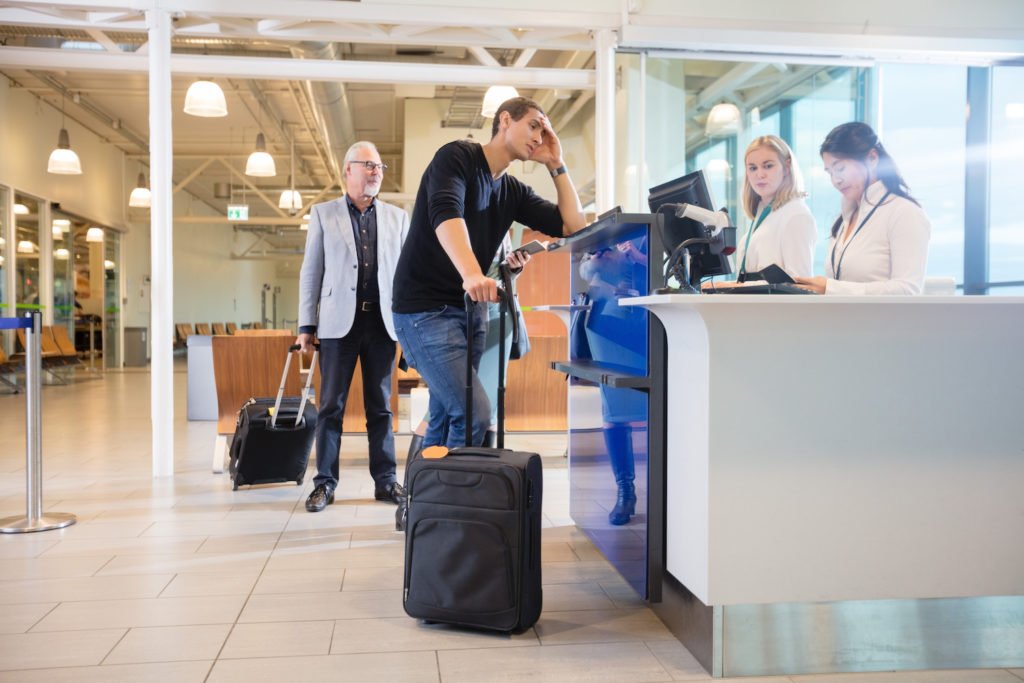 Traveler at gate in airport - states have different rules for when a defendant can leave the county while on probation