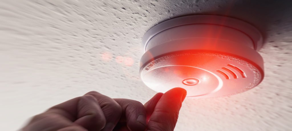Man tampering with smoke detector in violation of PC 148.4.