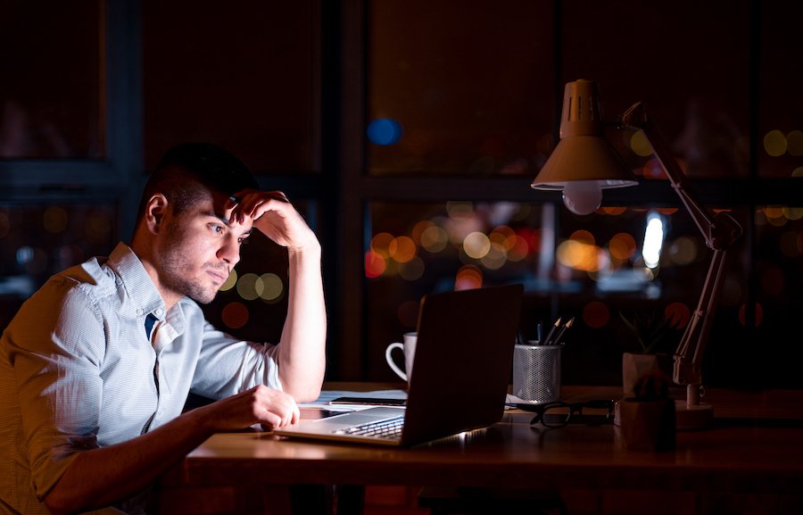 White-collar worker working late in office