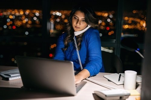 White-collar employee working late in office who is not entiteld to overtime pay