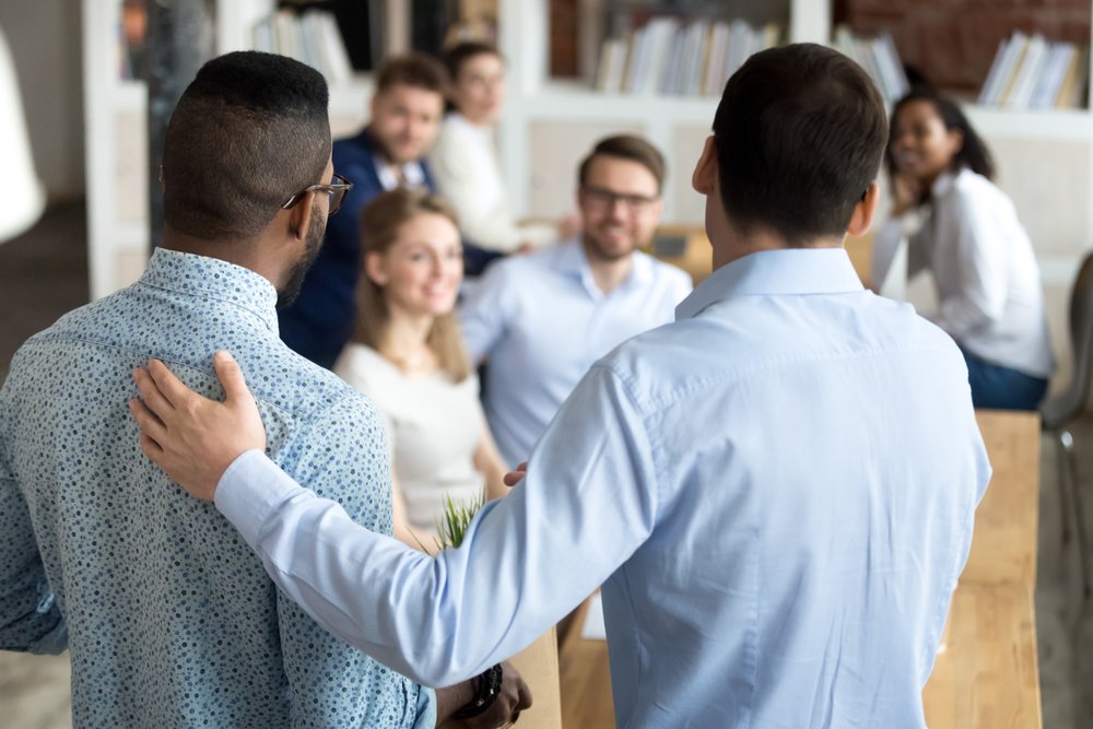 a prospective employee being shown around