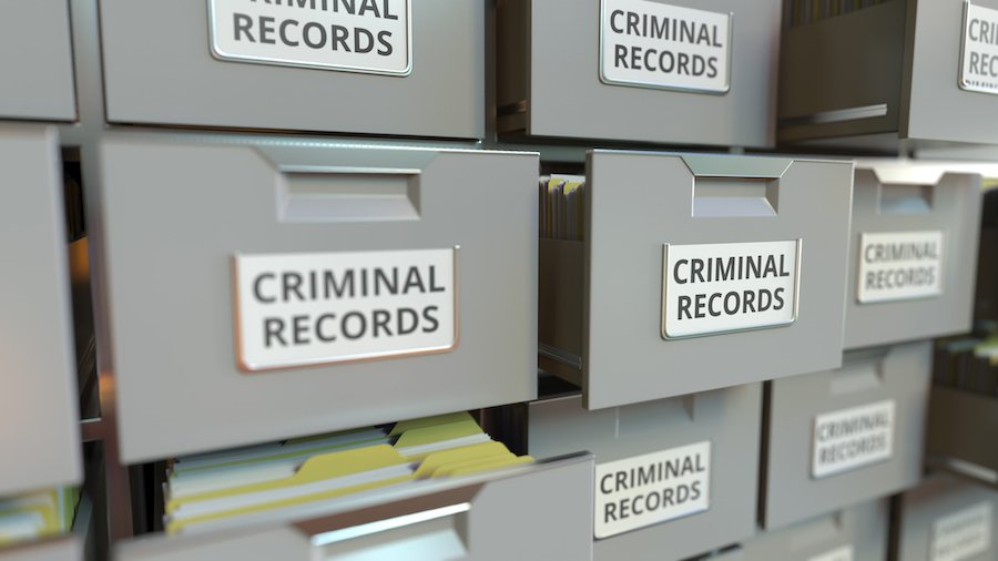 Filing cabinets labeled criminal records