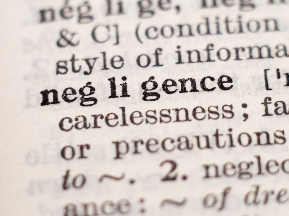 Focus placed on the word negligence in the dictionary.