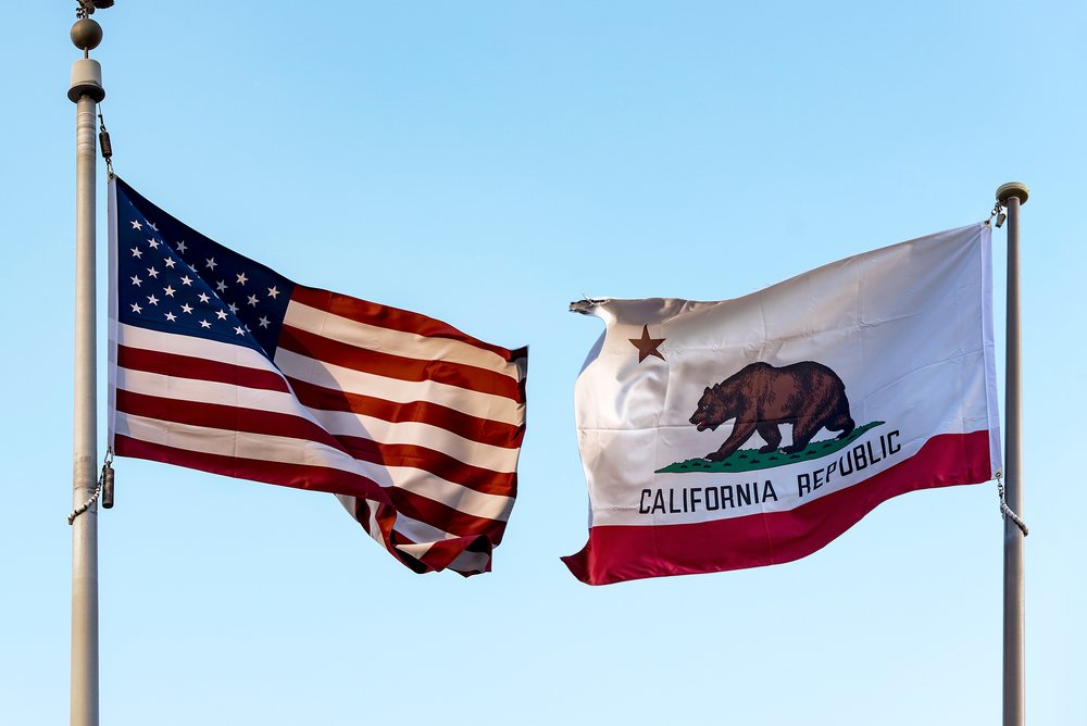 California and USA flags.
