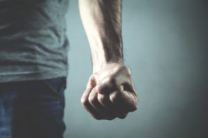 A clenched fist following an assault