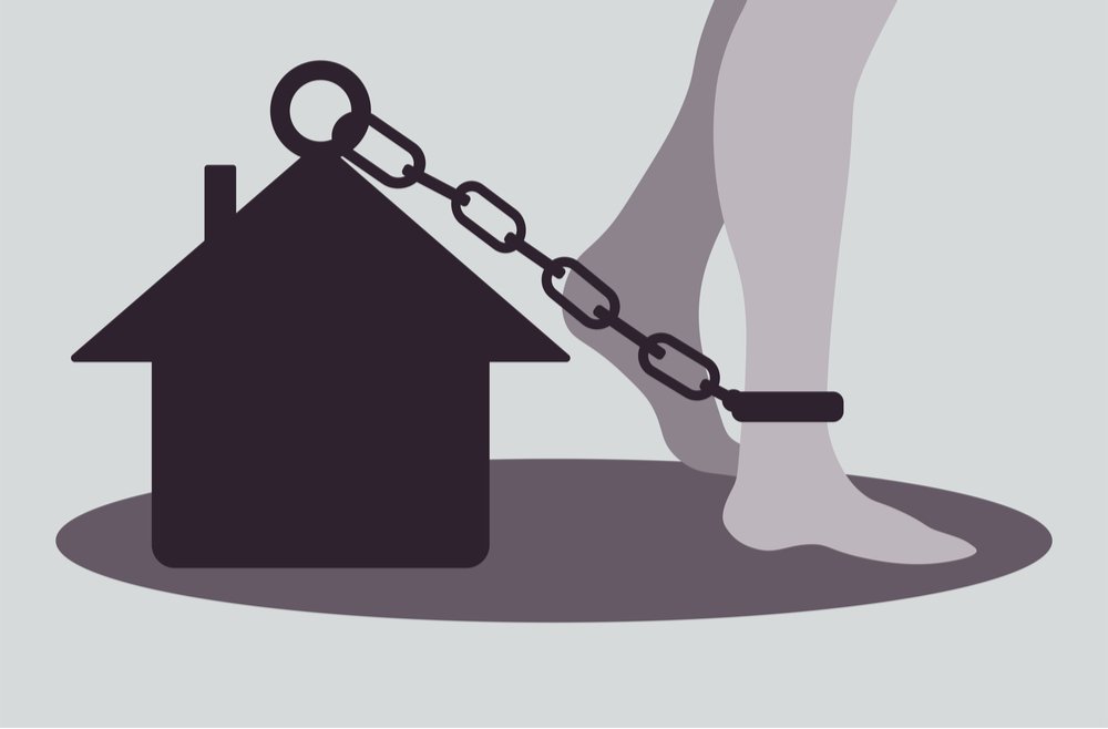 An illustration of an ankle chained to a house to illustrate house arrest in California