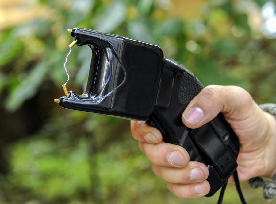 Closeup of hand holding stun gun