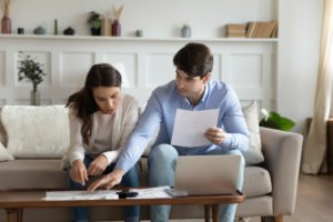 A couple preparing documents.