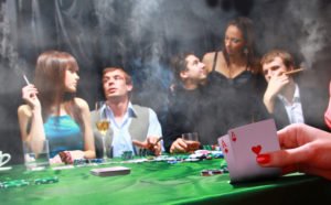 Smokers at a blackjack table, which is lawfuil in most Nevada casinos