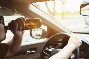 Driver drinking from beer bottle prior to DUI arrest