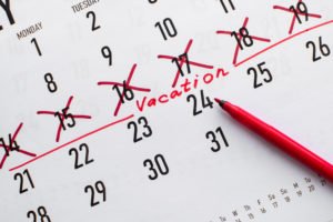 A calendar with vacation days marked off.