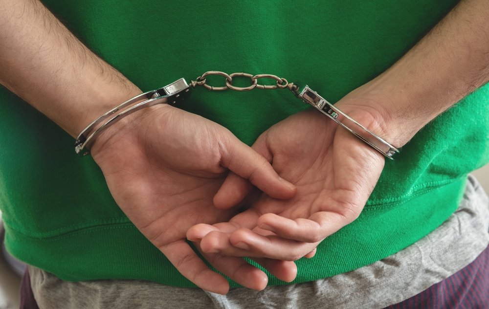A person handcuffed - a violation of Vehicle Code 23110 VC can result in jail or prison time. 