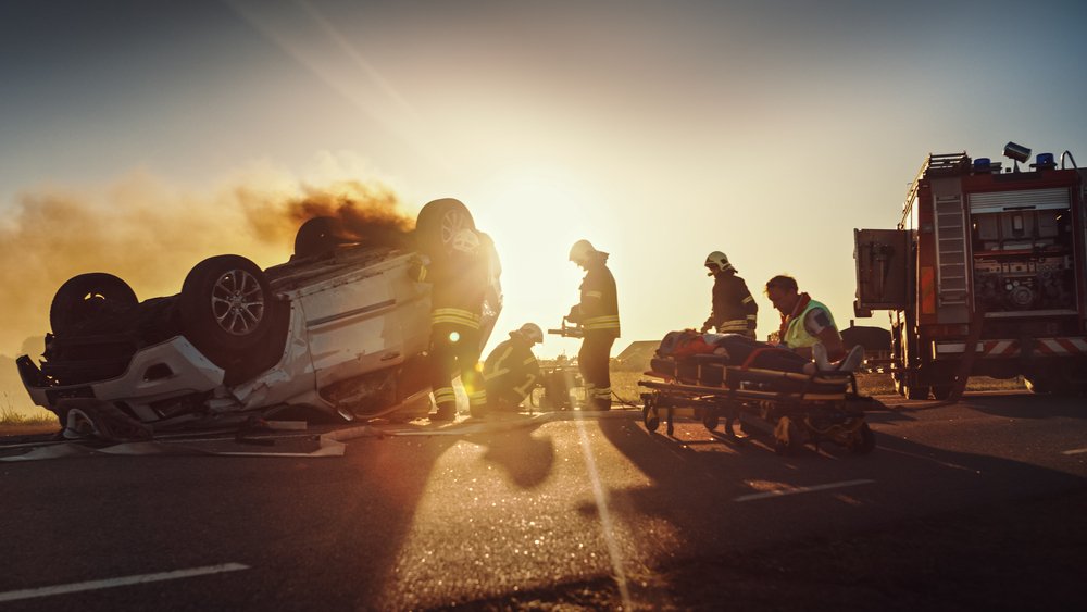 EMTs helping out after a car accident.