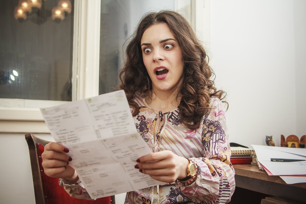 A woman shocked by a bill she just received.