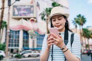 Woman on cell phone outside of Las Vegas casino