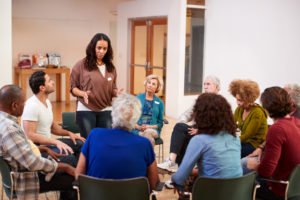 A counselor conducting a group counseling session, as an example of one form of diversion.