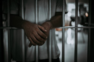 A man placed behind bars at the local jail for ICE, also known as an ICE Hold.