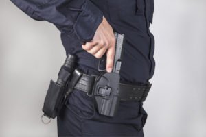 Policeman holding a gun