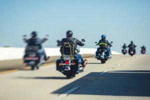 Three motorcycles on highway