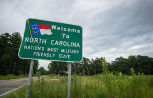 A roadsign that says "Welcome to North Carolina"