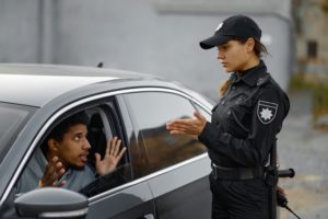 A police officer requesting consent from the suspect.