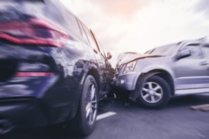 Aftermath of car crash after one of the drivers was negligent per se