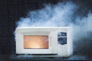 malfunctioning, smoky microwave