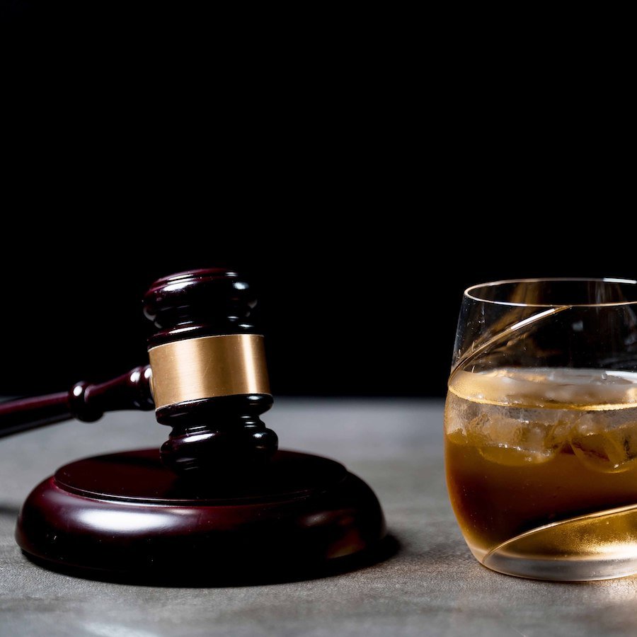 Judge's Gavel and glass of whisky